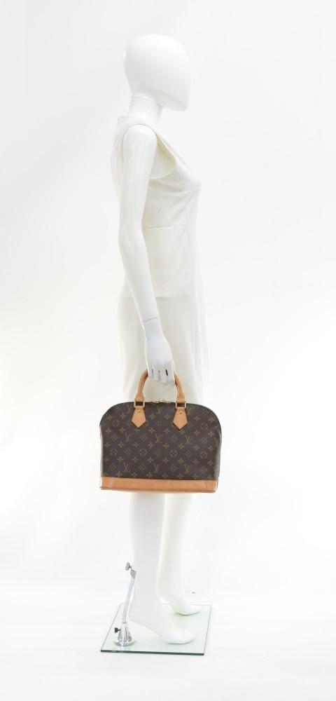 Louis Vuitto Alma Monogram Canvas Handbag