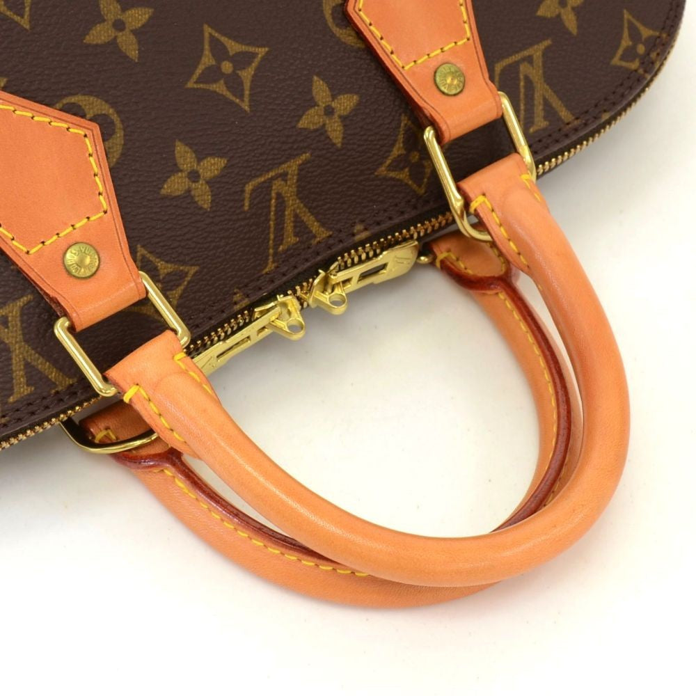 Louis Vuitto Alma Monogram Canvas Handbag