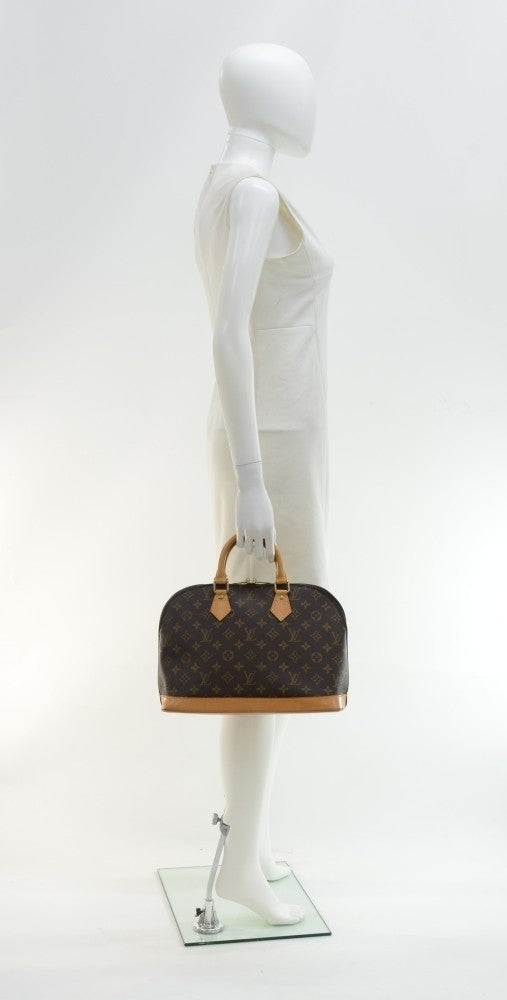 Louis Vuitto Alma Monogram Canvas Handbag