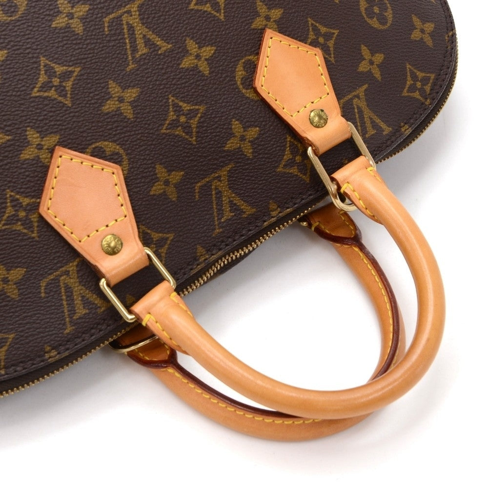 Louis Vuitto Alma Monogram Canvas Handbag