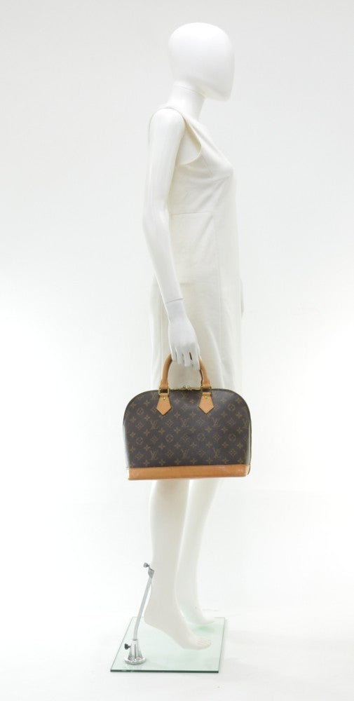 Louis Vuitto Alma Monogram Canvas Handbag