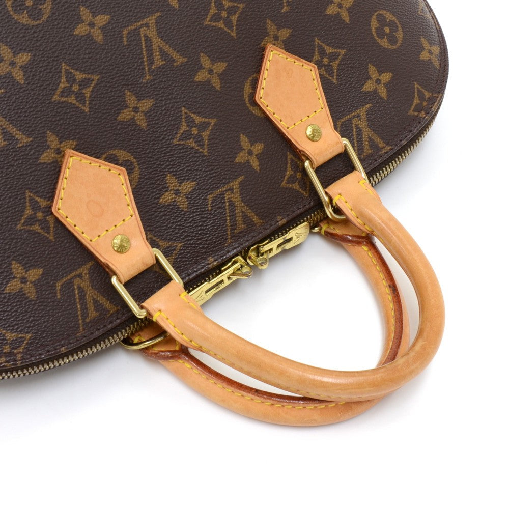 Louis Vuitto Alma Monogram Canvas Handbag with Strap