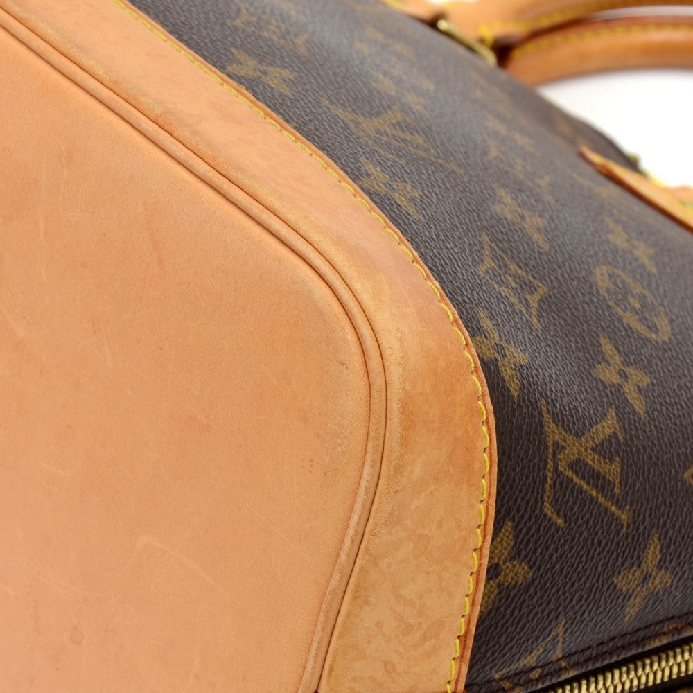 Louis Vuitto Alma Monogram Canvas Handbag with Strap