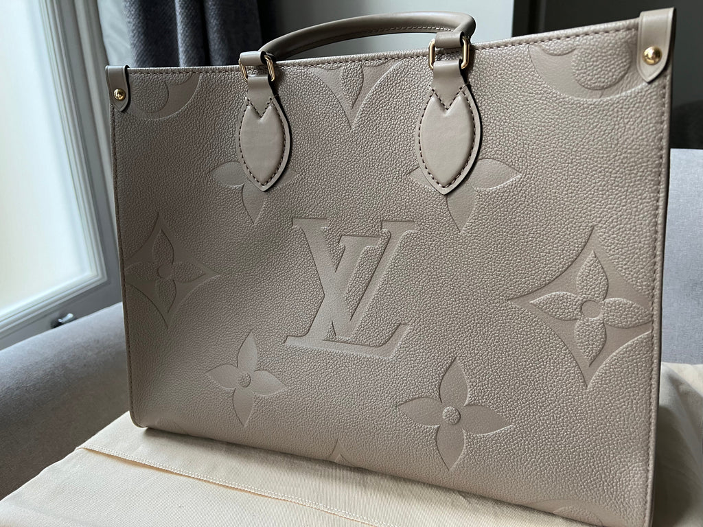 Louis Vuitton On the Go MM Dune Empreinte (RRP £2,480)