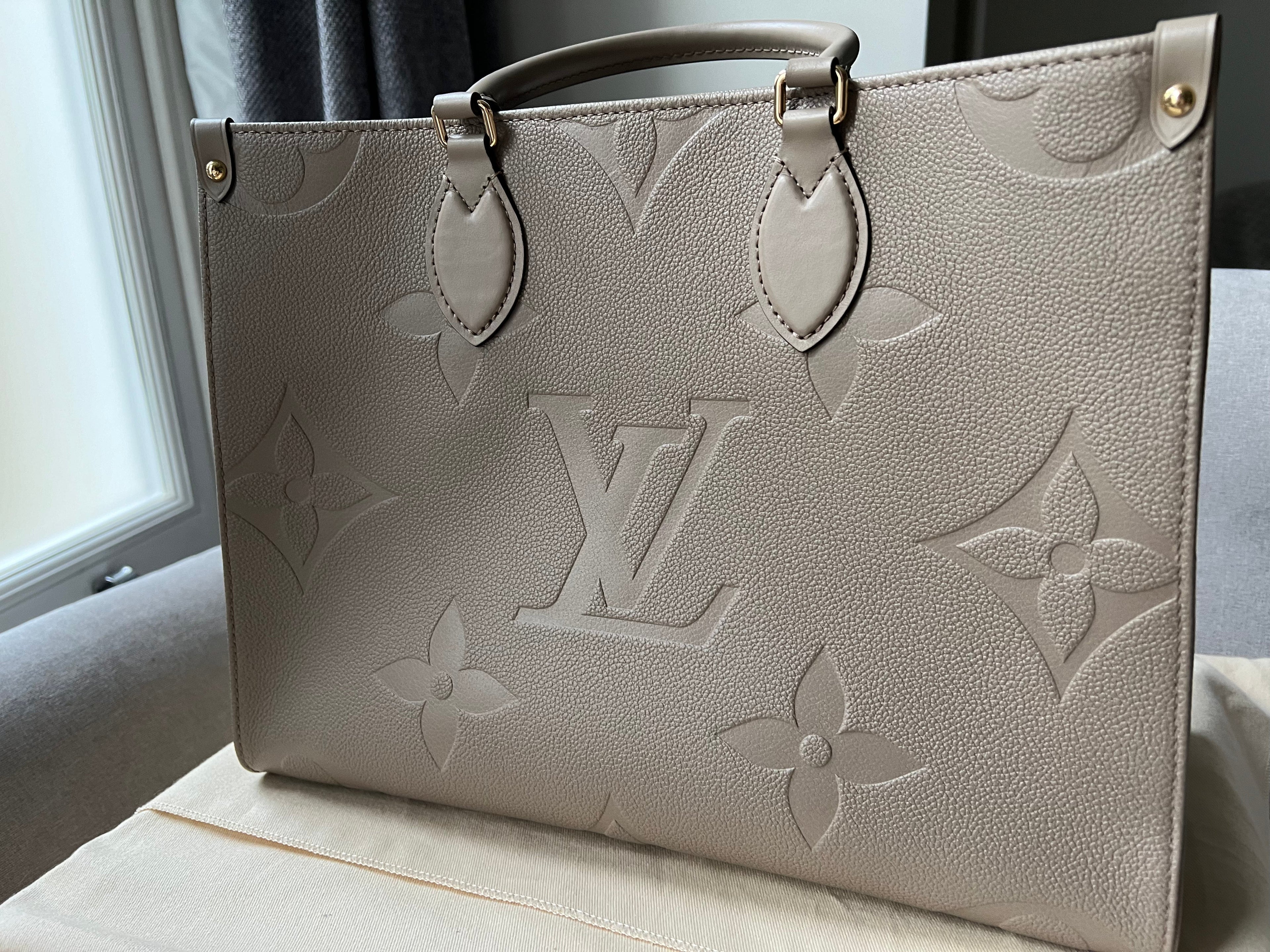 Louis Vuitton On the Go MM Dune Empreinte (RRP £2,480)