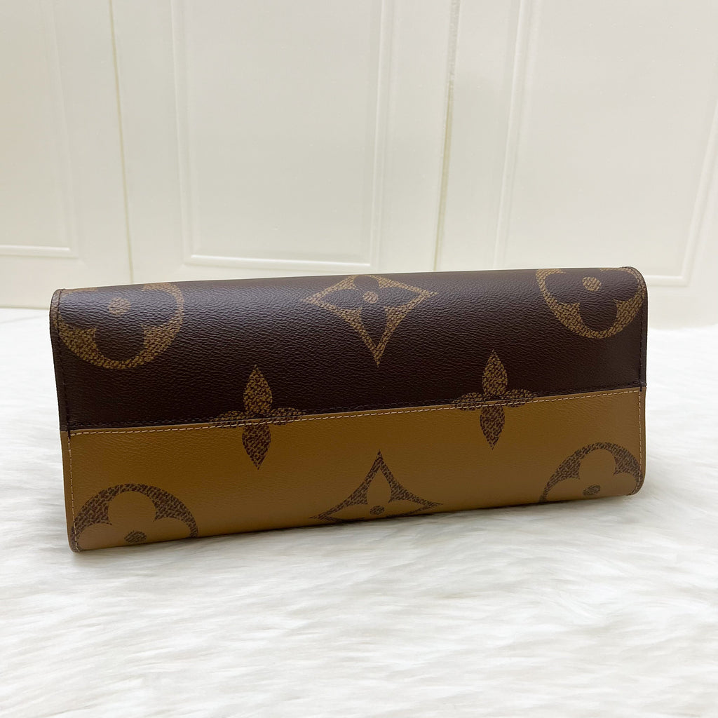 LV Onthego MM in Reverse Giant Monogram Canvas and GHW
