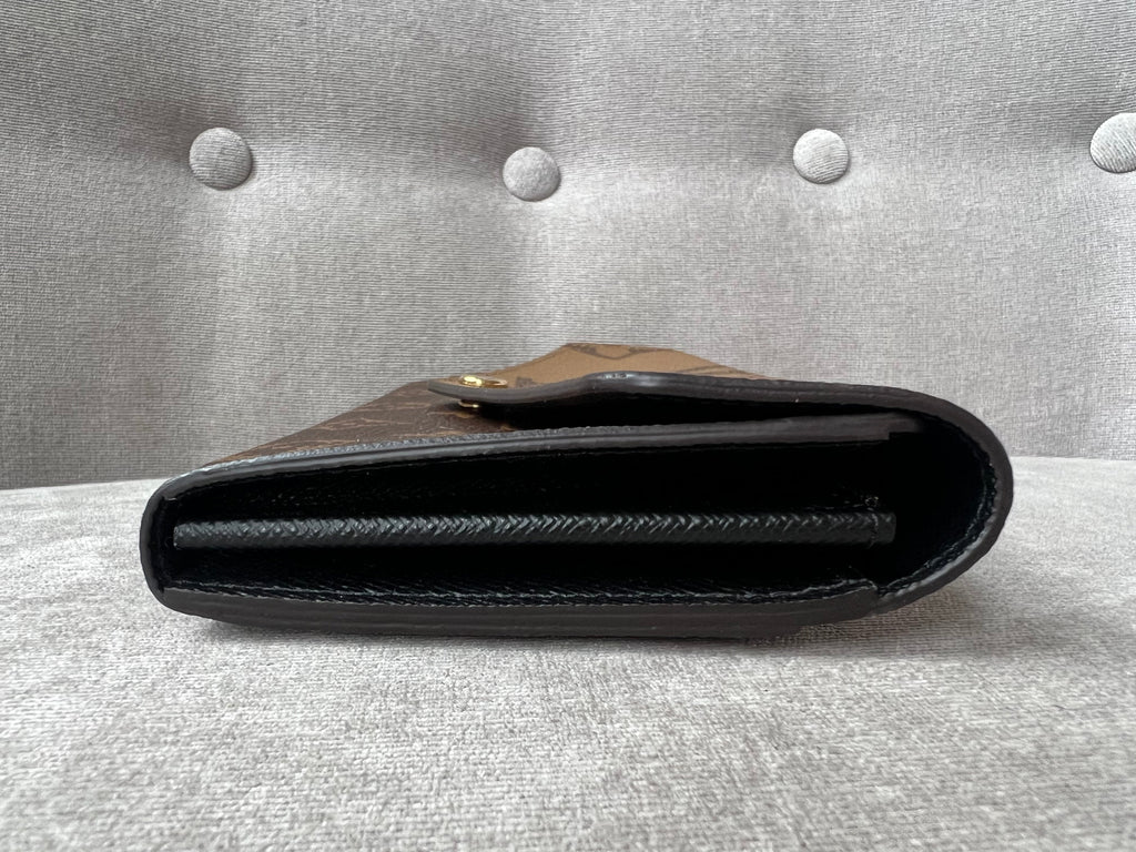 Louis Vuitton Sarah Wallet in reverse Monogram and Brown (RRP £550)