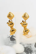 Boucles d'oreilles dorÃƒÆ’Ã‚Â©es Chanel