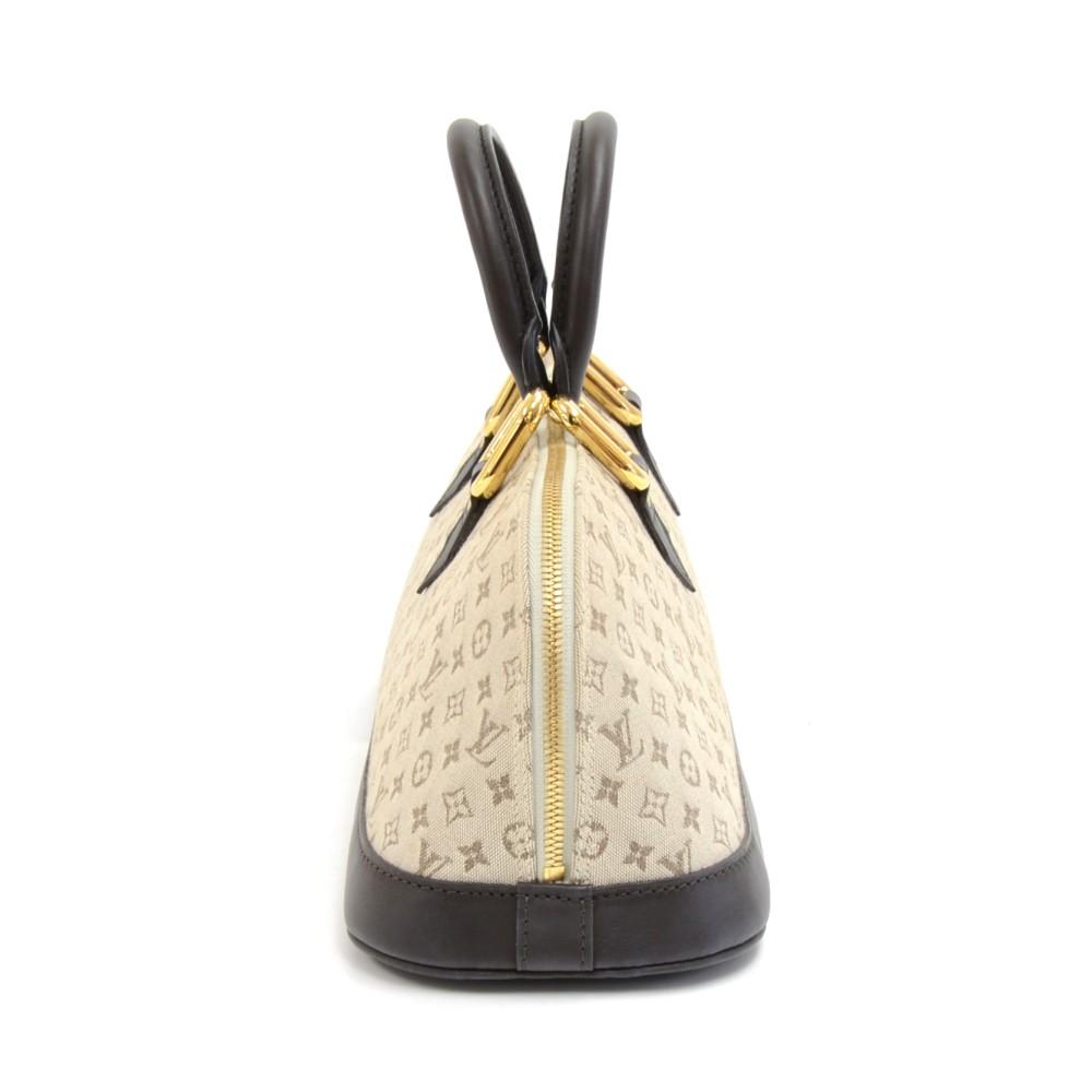 Louis Vuitto Alma Long Mini Lin Canvas Handbag