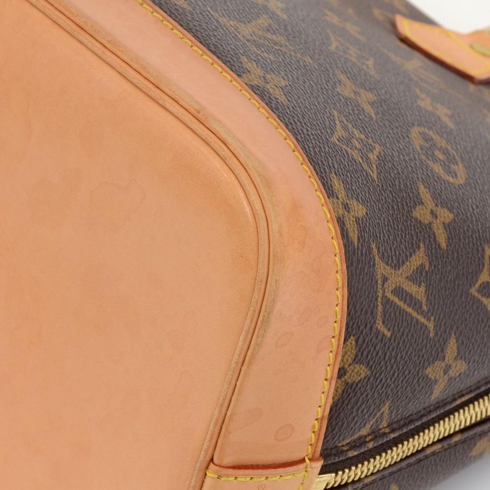 Louis Vuitto Alma Monogram Canvas Handbag