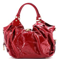Louis Vuitton L Hobo Surya Leather