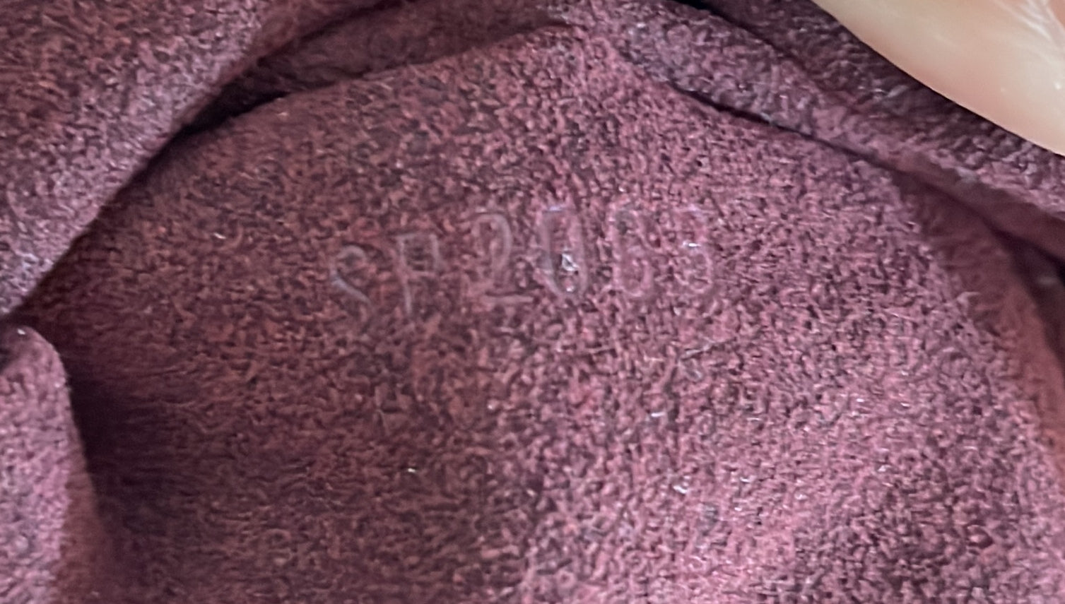 Louis Vuitton L Hobo Surya Leather