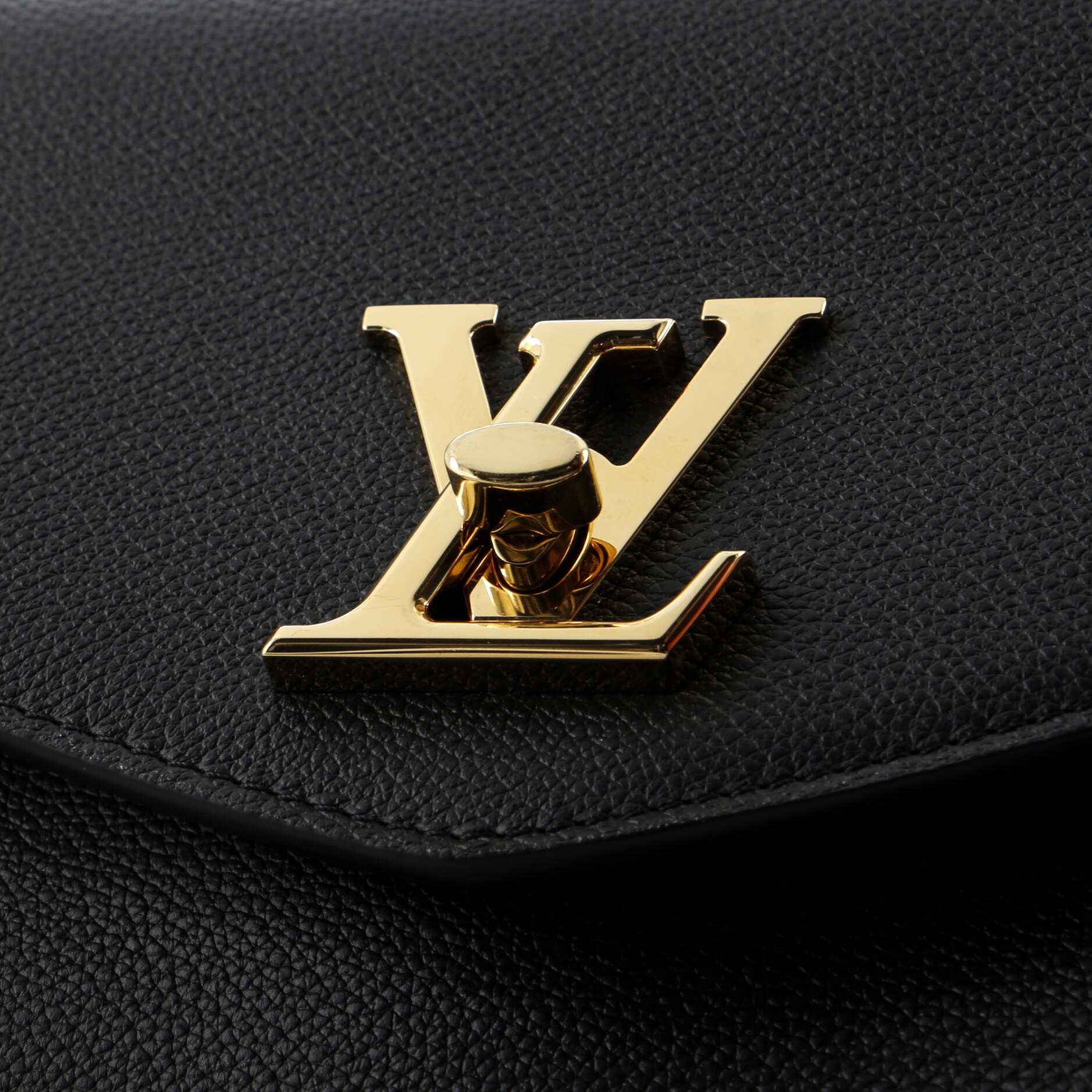 Louis Vuitton Oxford Lockme Handbag Leather