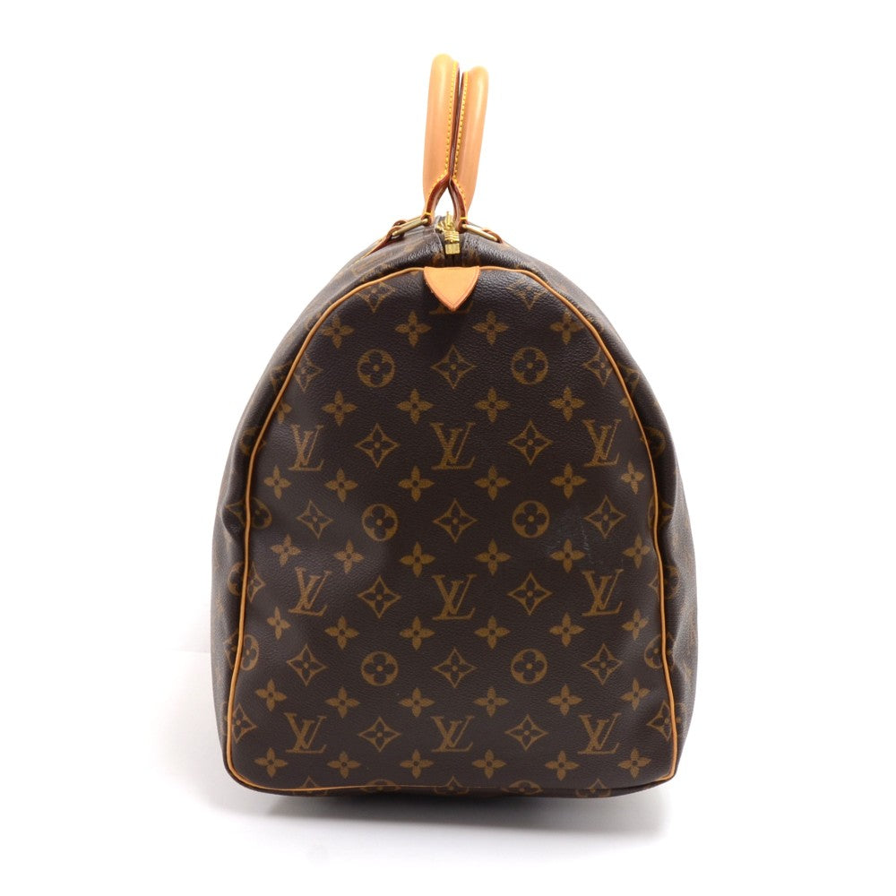 Louis Vuitto Keepall 55 Monogram Canvas Travel Bag