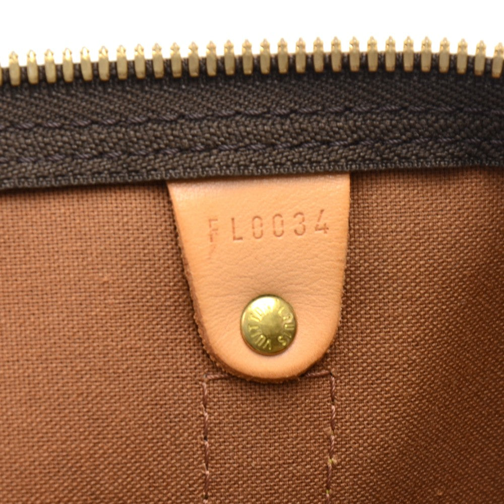 Louis Vuitto Keepall 55 Monogram Canvas Travel Bag