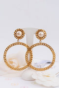 Boucles d'oreilles dorées Chanel