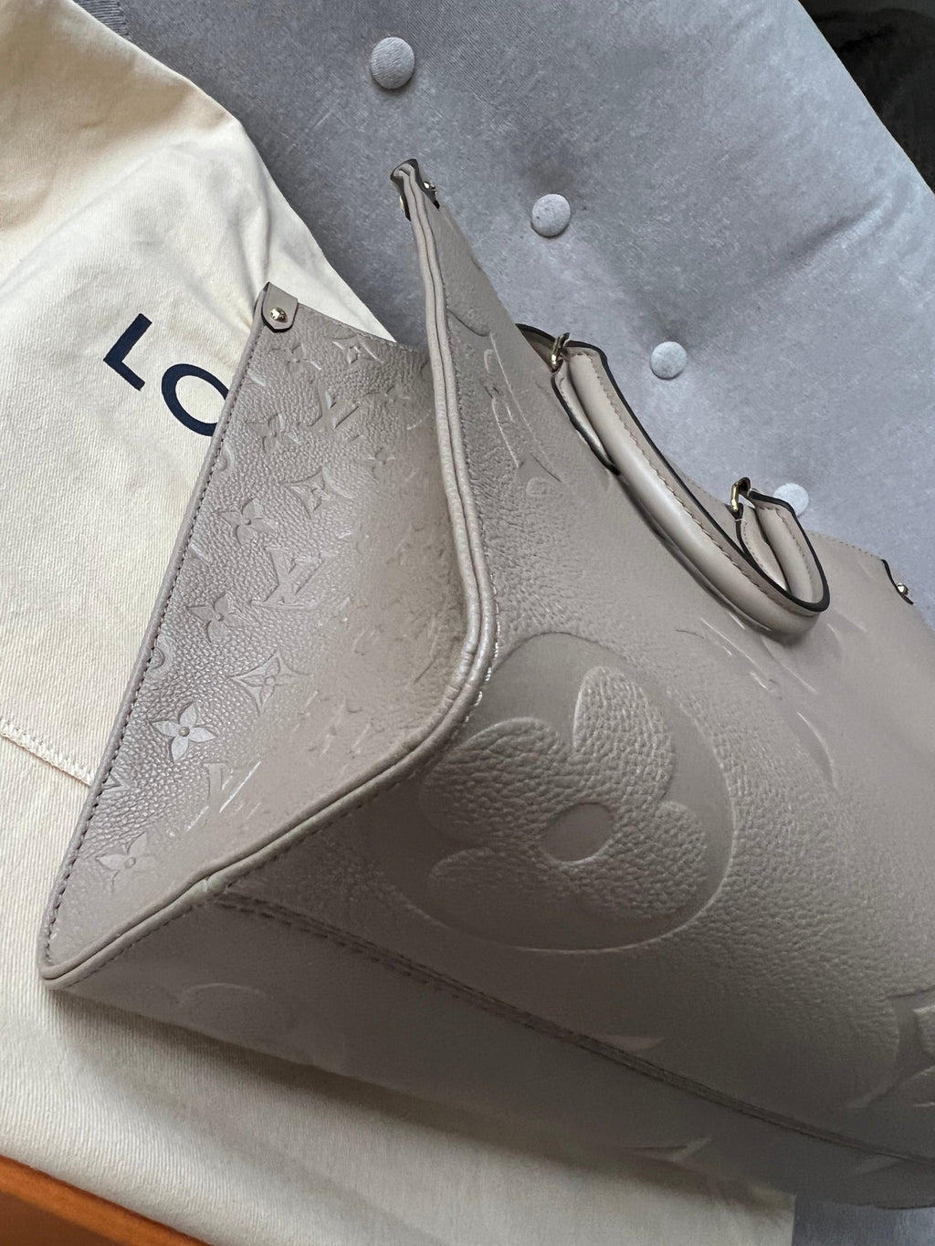 Louis Vuitton On the Go MM Dune Empreinte (RRP £2,480)