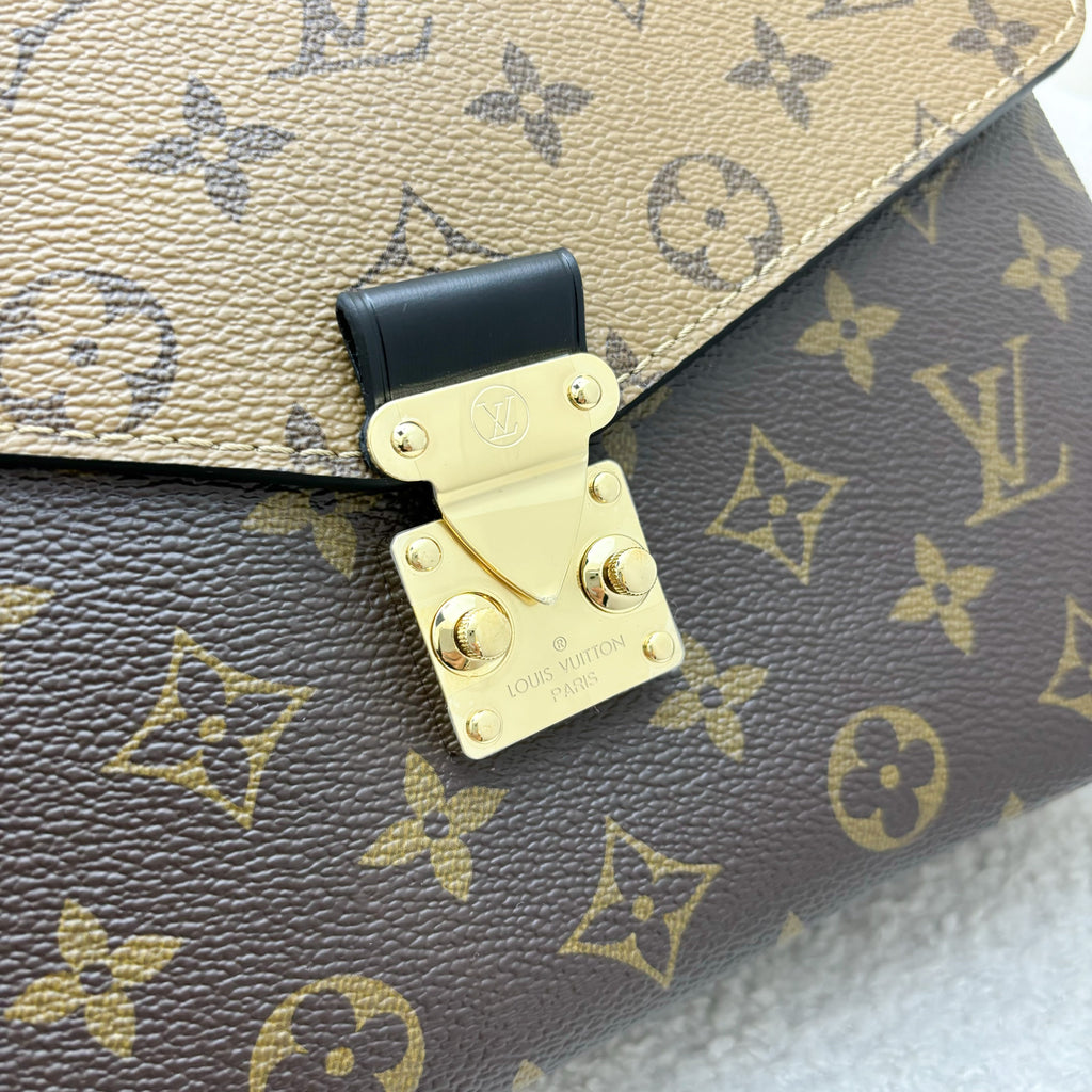 LV Pochette Metis in Reverse Monogram Canvas, Black Leather and GHW