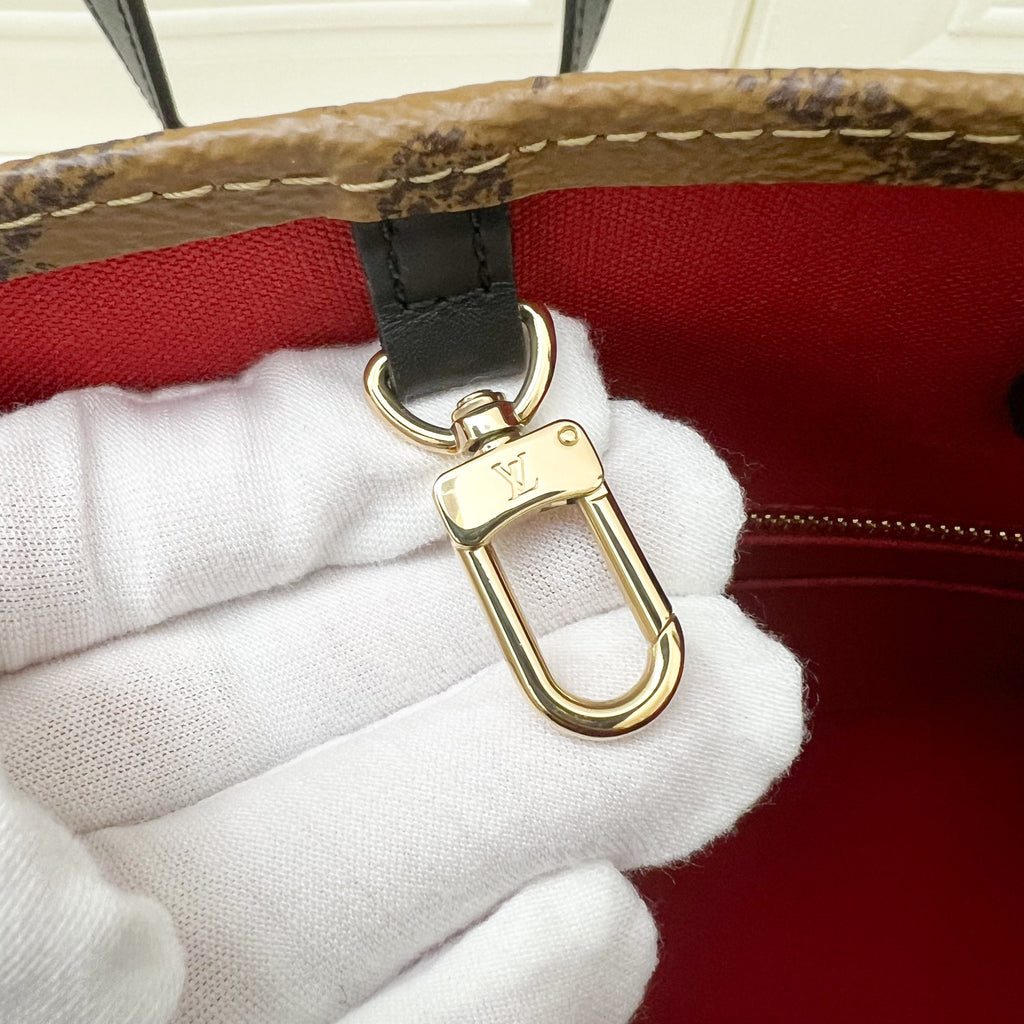 LV Onthego MM in Reverse Giant Monogram Canvas and GHW