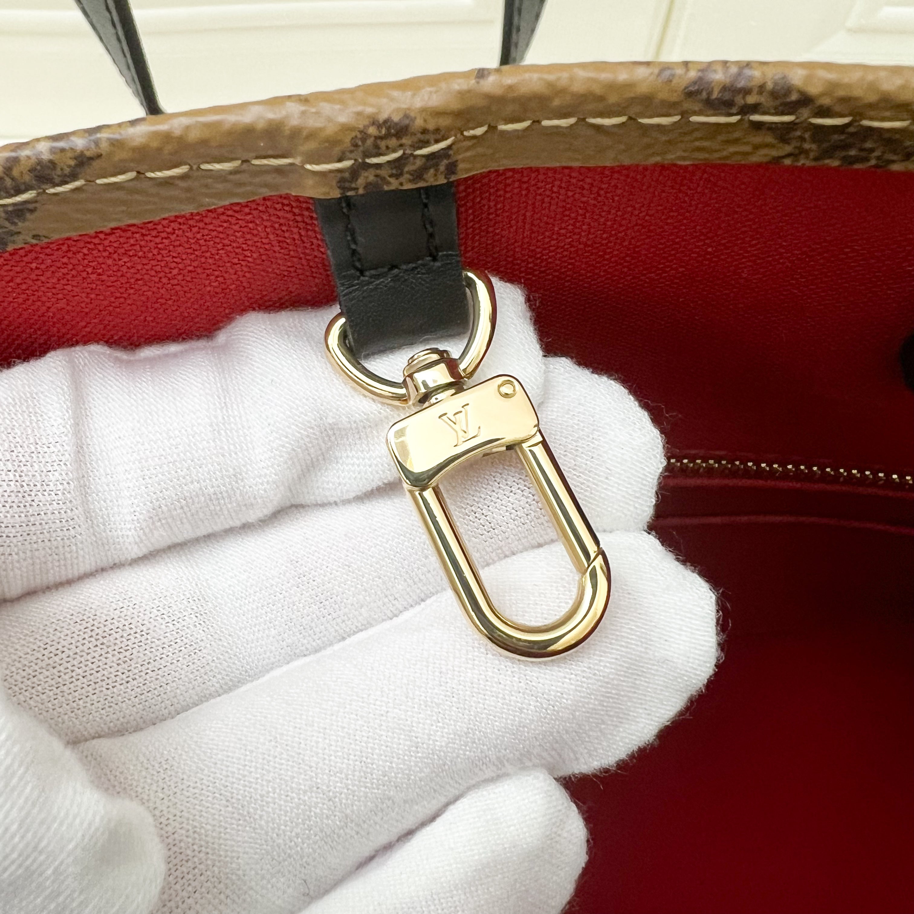 LV Onthego MM in Reverse Giant Monogram Canvas and GHW