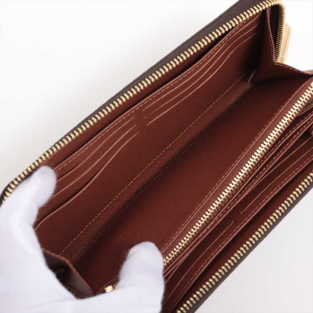 Louis Vuitton monogram zipper wallet M42616 round zipper wallet  reaction    store