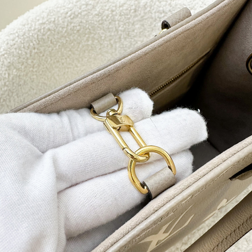 LV Onthego PM in Tourterelle (Grey) / Creme Giant Monogram Empreinte Leather and GHW
