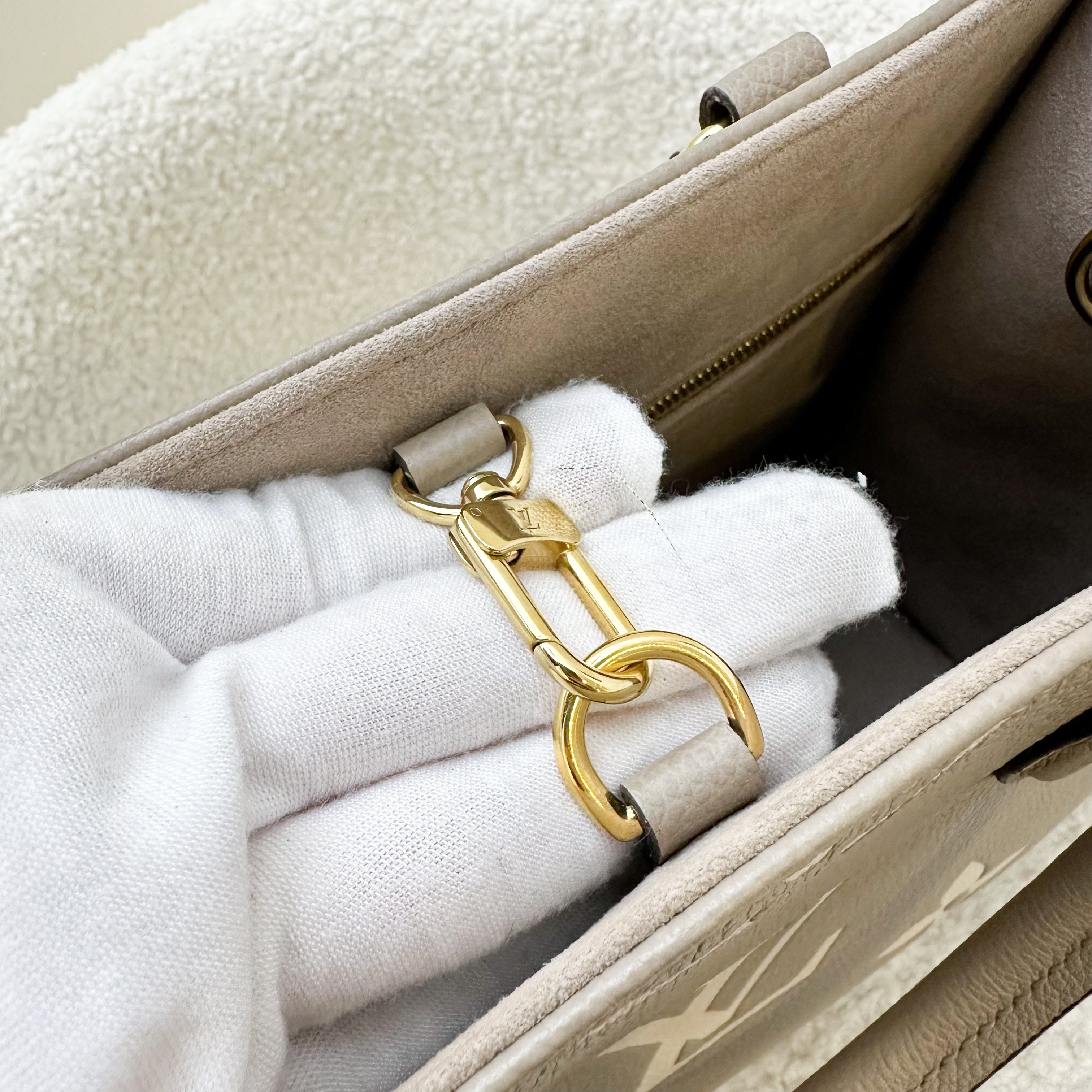 LV Onthego PM in Tourterelle (Grey) / Creme Giant Monogram Empreinte Leather and GHW