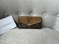 Louis Vuitton Sarah Wallet in reverse Monogram and Brown (RRP £550)