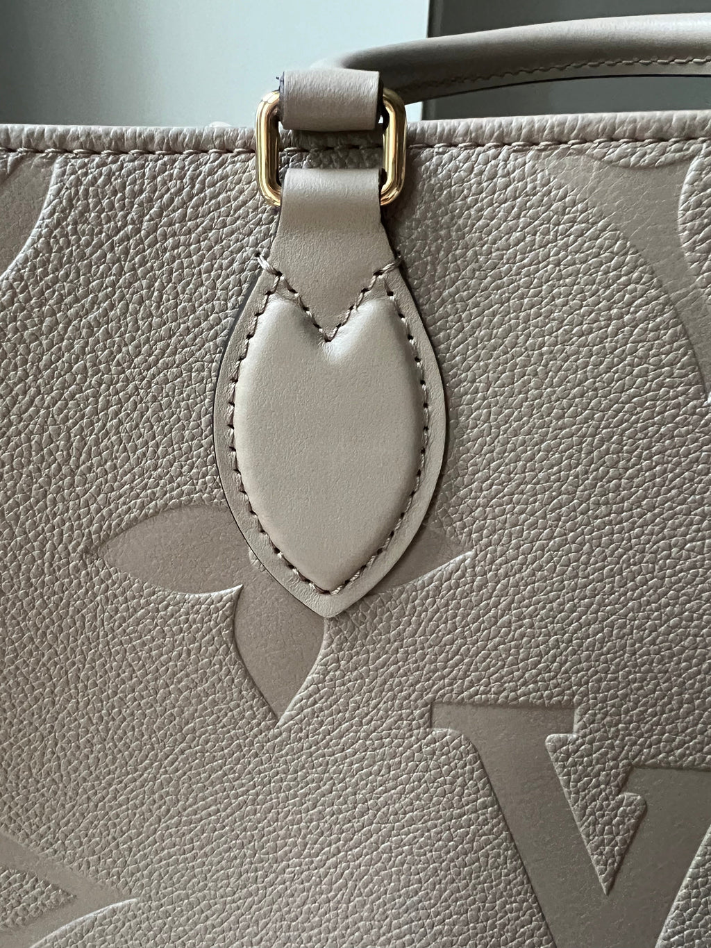 Louis Vuitton On the Go MM Dune Empreinte (RRP £2,480)