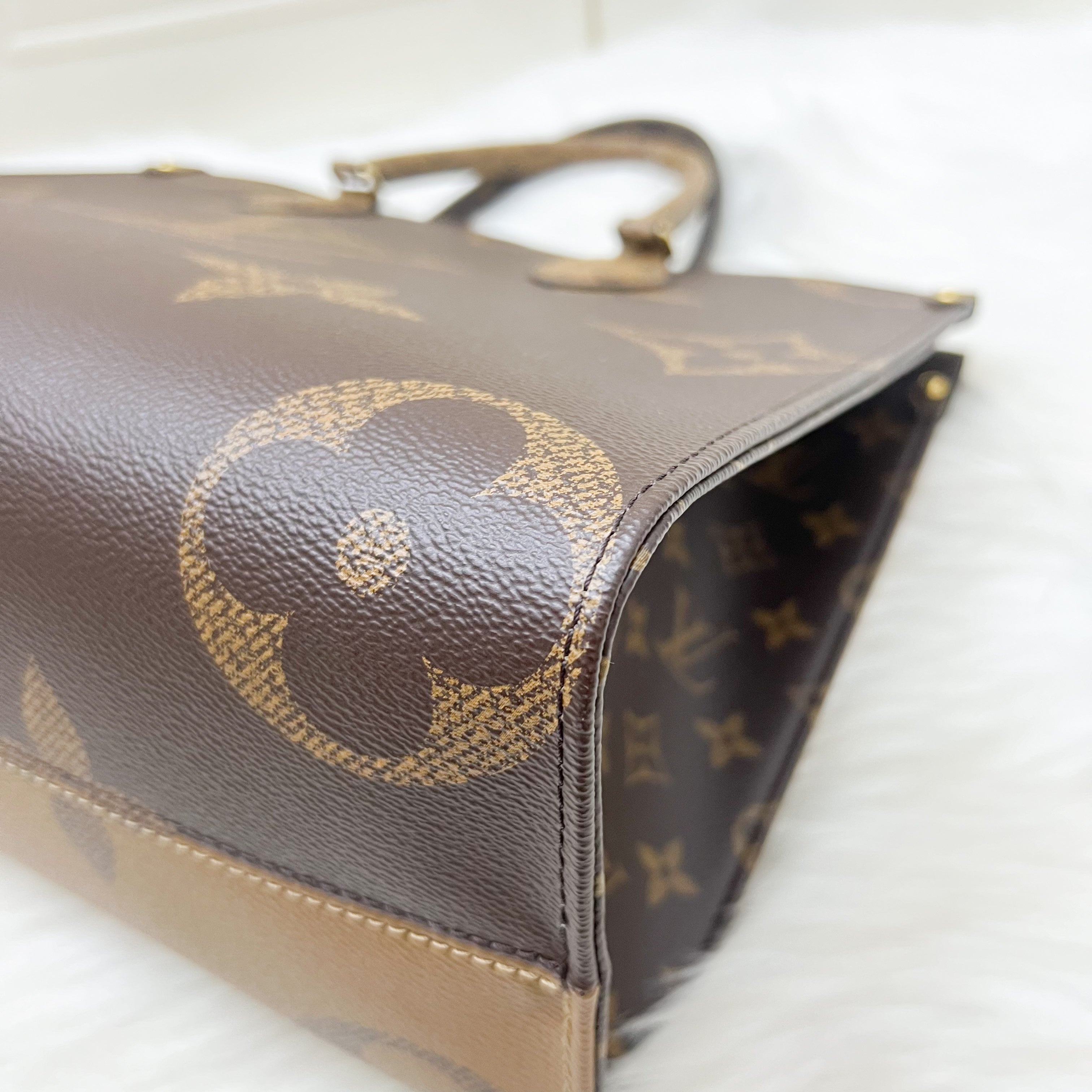 LV Onthego MM in Reverse Giant Monogram Canvas and GHW