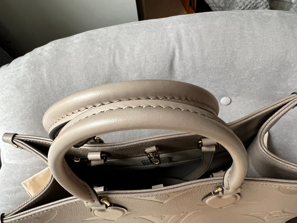 Louis Vuitton On the Go MM Dune Empreinte (RRP £2,480)
