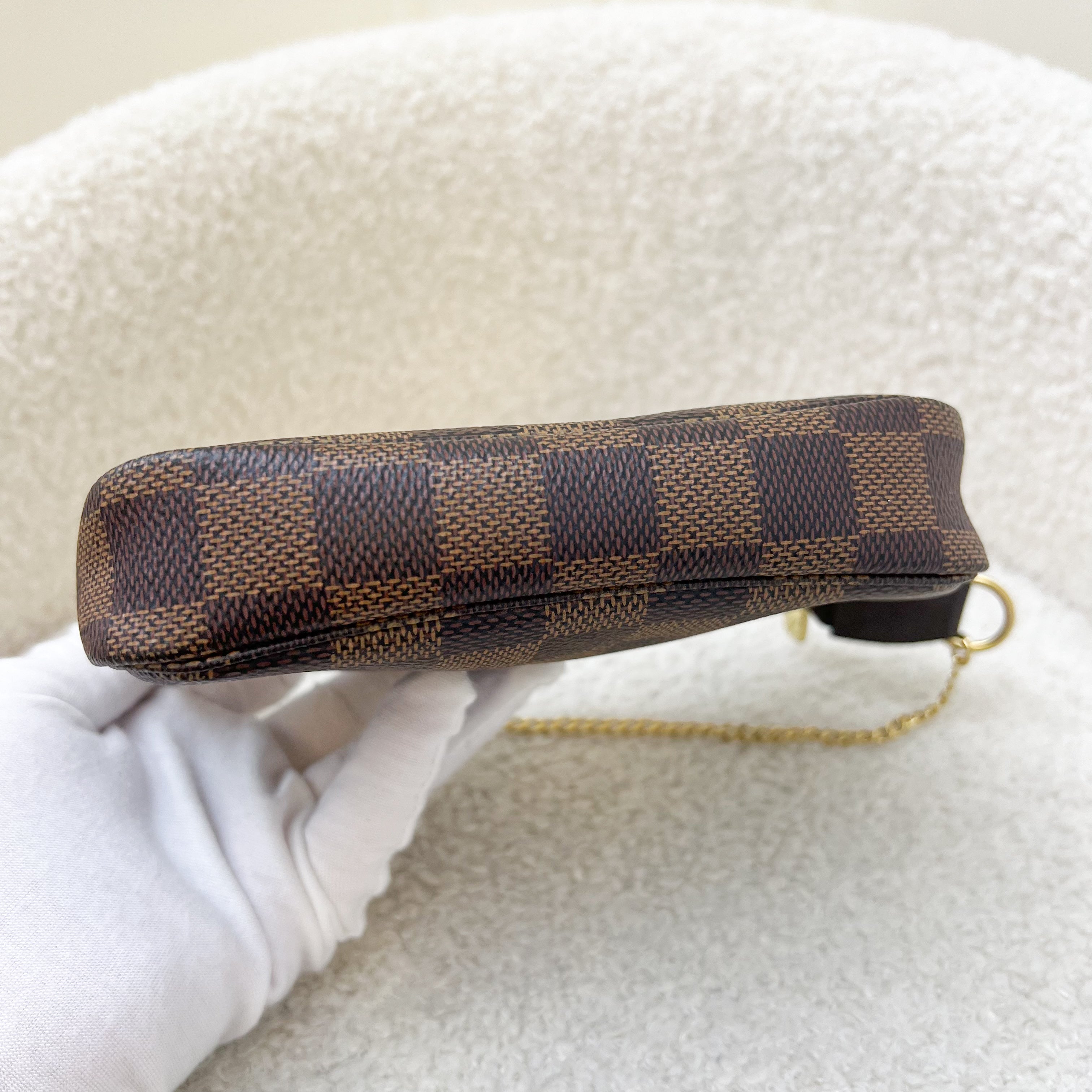 LV Mini Pochette Accessoires in Damier Ebene Canvas GHW