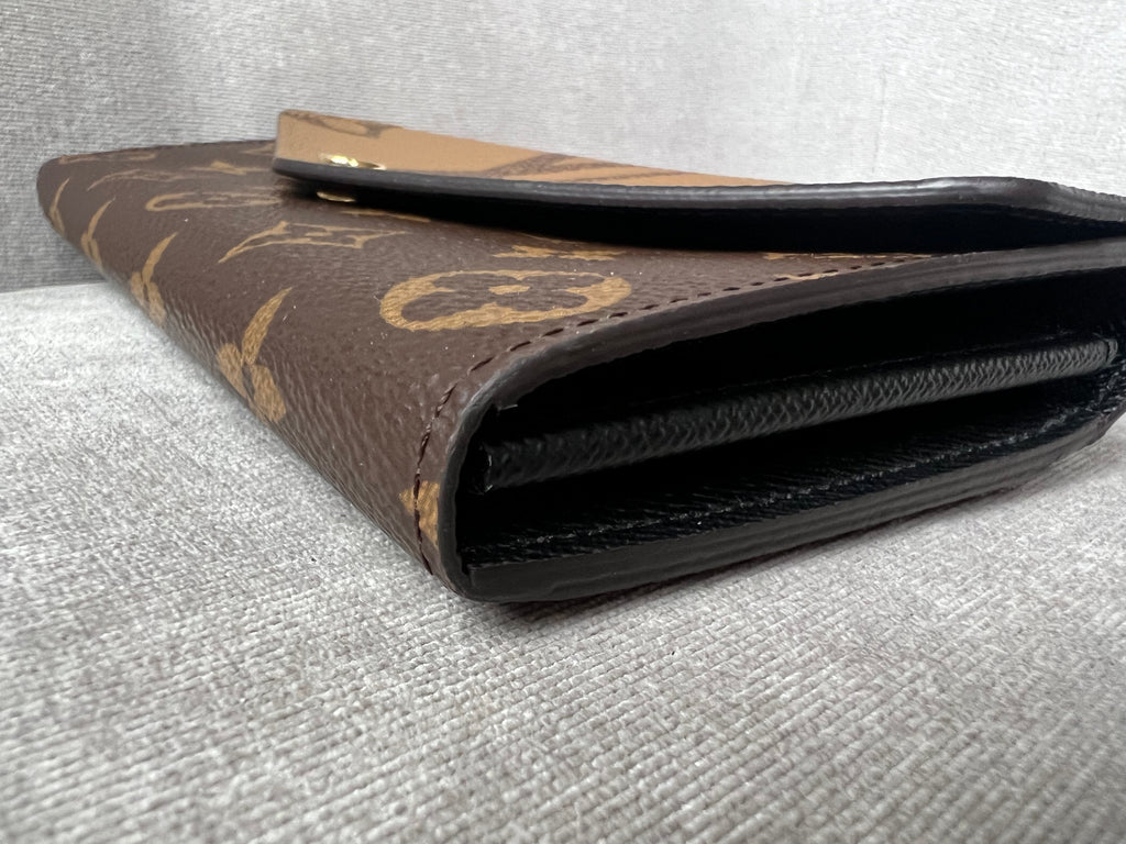 Louis Vuitton Sarah Wallet in reverse Monogram and Brown (RRP £550)