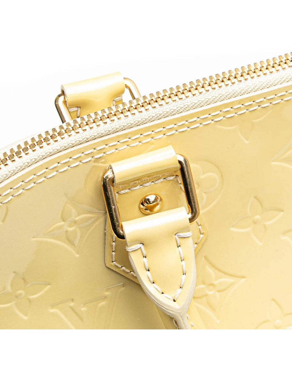 Monogram Vernis Alma PM Handbag with Rolled Handles and Interior Slip Pockets