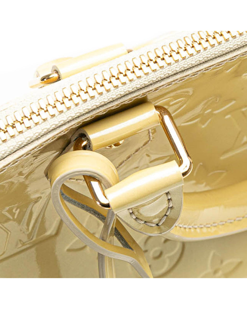 Monogram Vernis Alma PM Handbag with Rolled Handles and Interior Slip Pockets