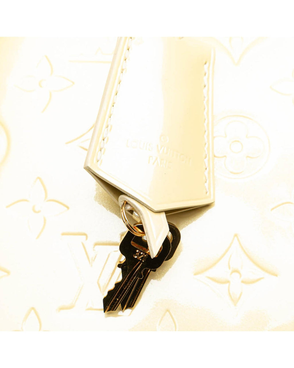 Monogram Vernis Alma PM Handbag with Rolled Handles and Interior Slip Pockets