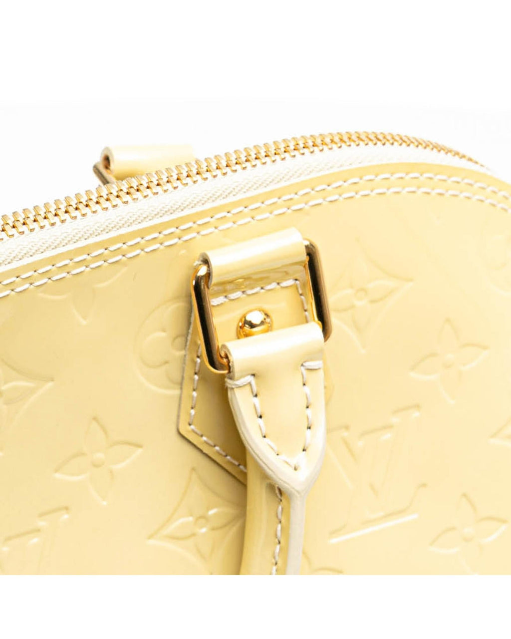 Monogram Vernis Alma PM Handbag with Rolled Handles and Interior Slip Pockets
