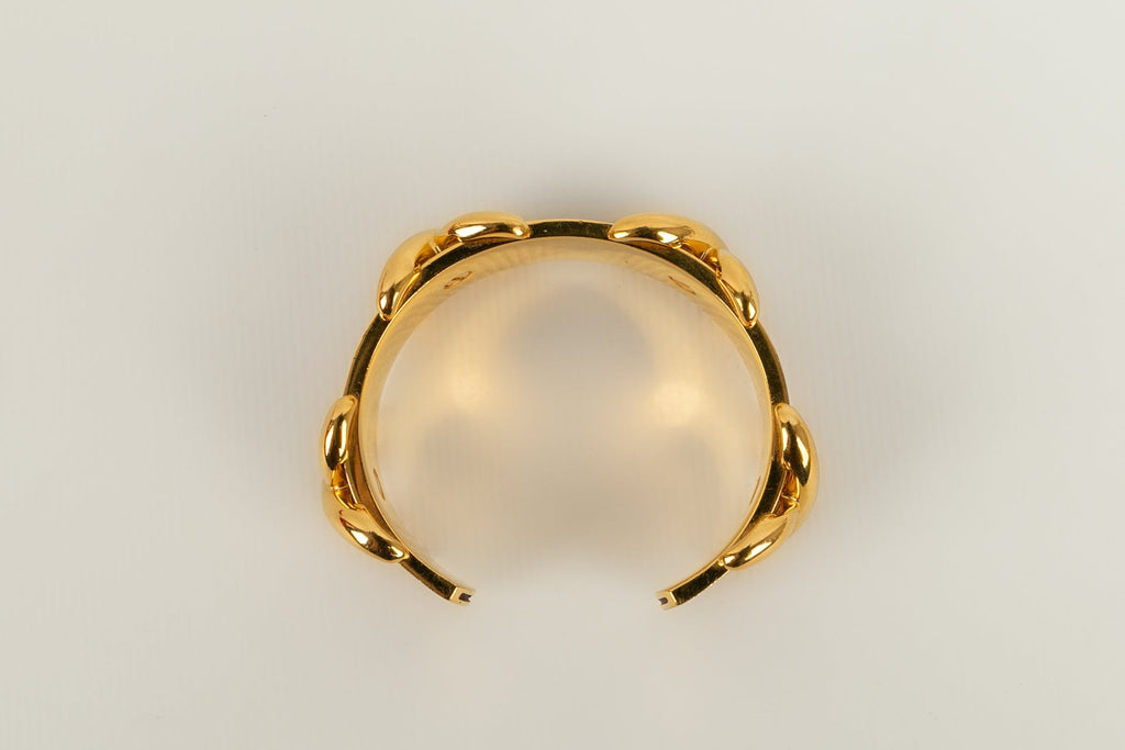 Bracelet en mÃƒÆ’Ã‚Â©tal dorÃƒÆ’Ã‚Â© et cuir HermÃƒÆ’Ã‚Â¨s