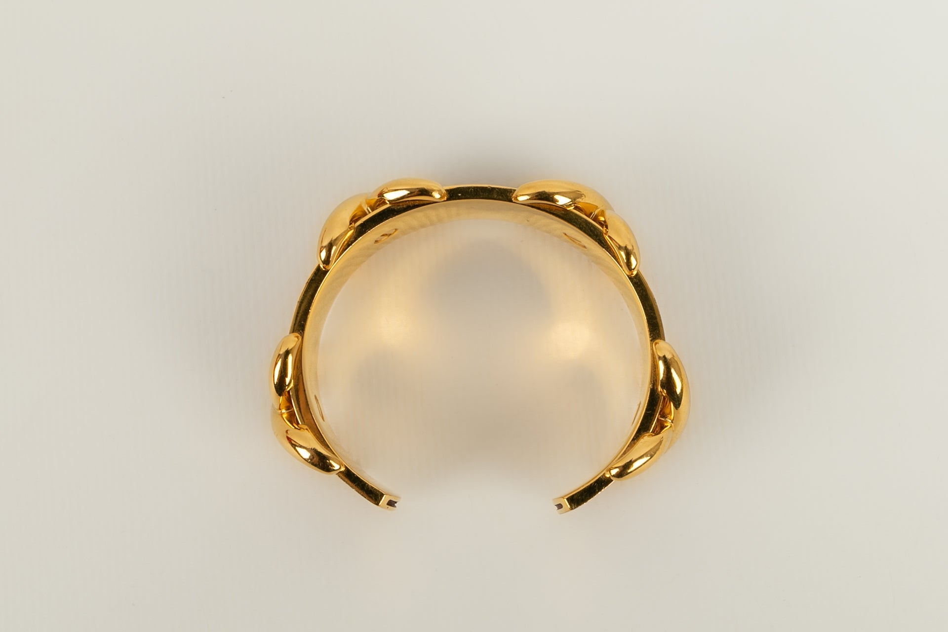 Bracelet en mÃƒÆ’Ã‚Â©tal dorÃƒÆ’Ã‚Â© et cuir HermÃƒÆ’Ã‚Â¨s