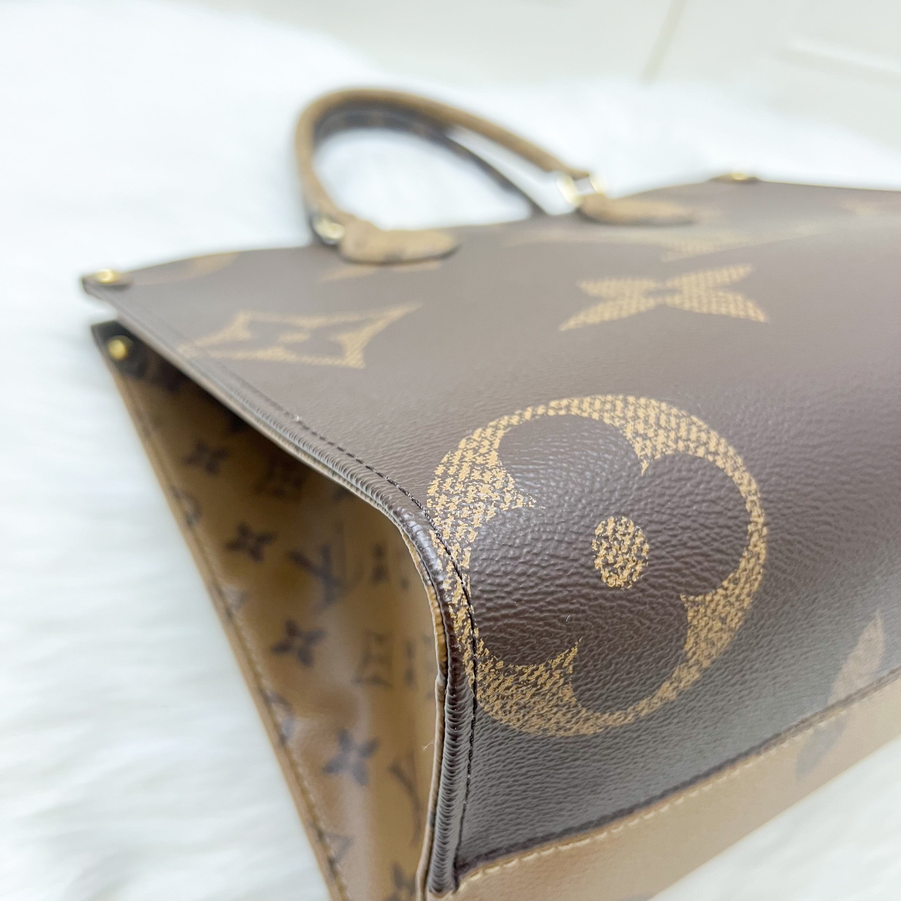 LV Onthego MM in Reverse Giant Monogram Canvas and GHW