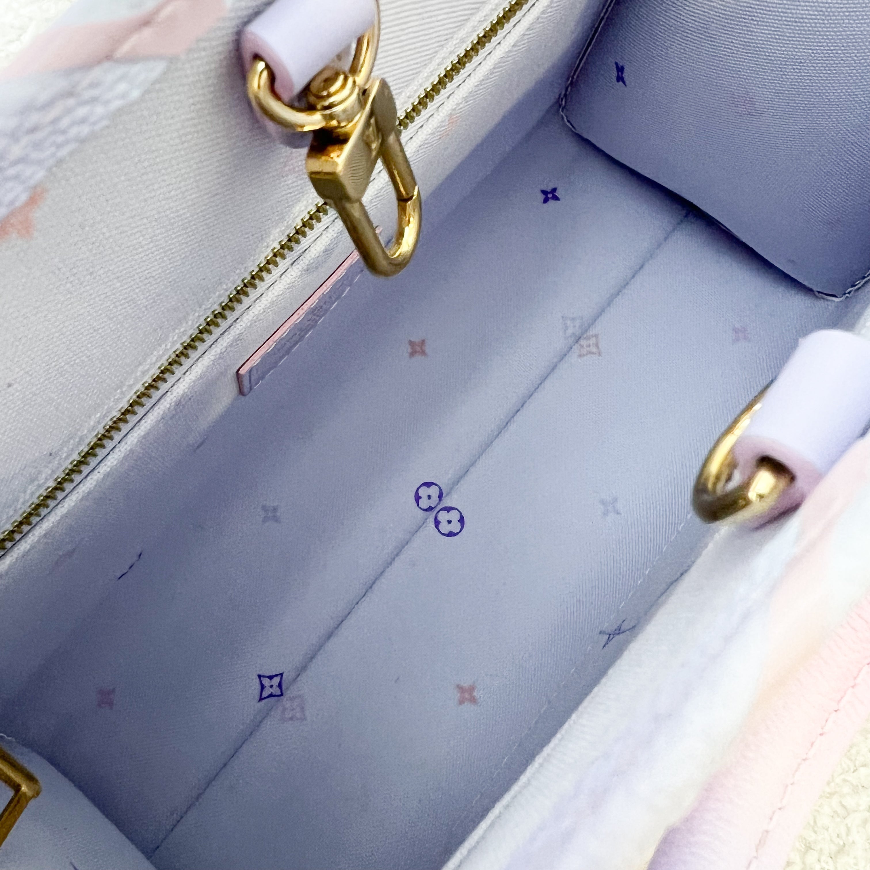 LV Onthego PM in Pastel Sunrise Monogram Empreinte Leather GHW