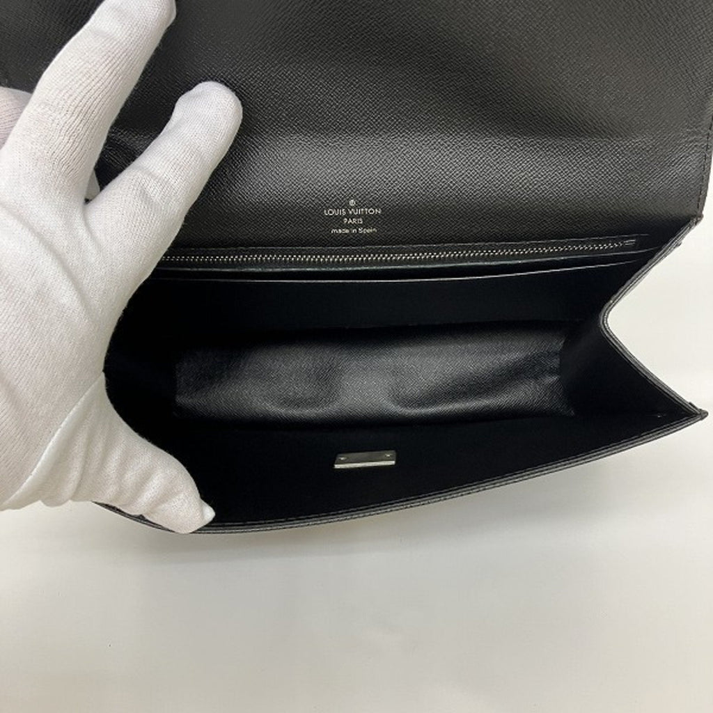 Louis Vuitton Selenga  Leather Clutch Bag ()