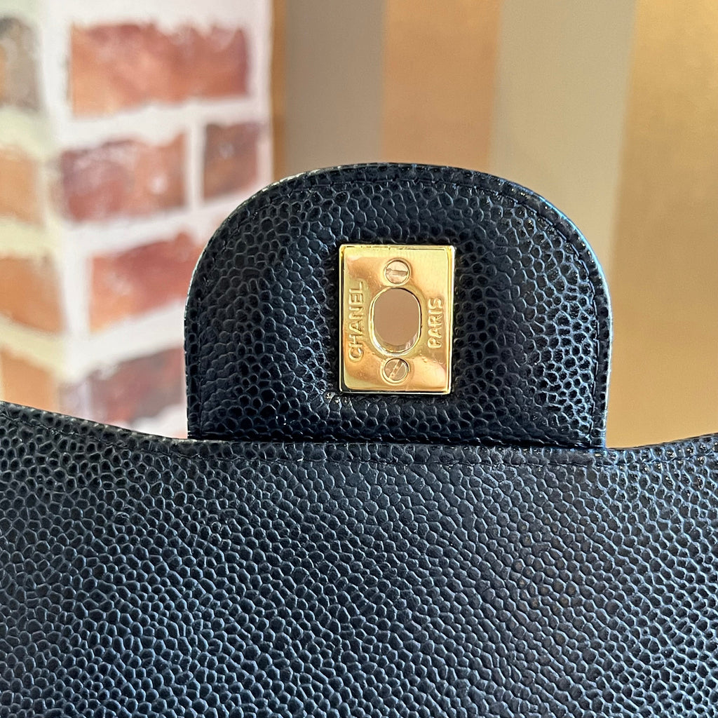 CHANEL Double Flap Jumbo Caviar Shoulder Bag