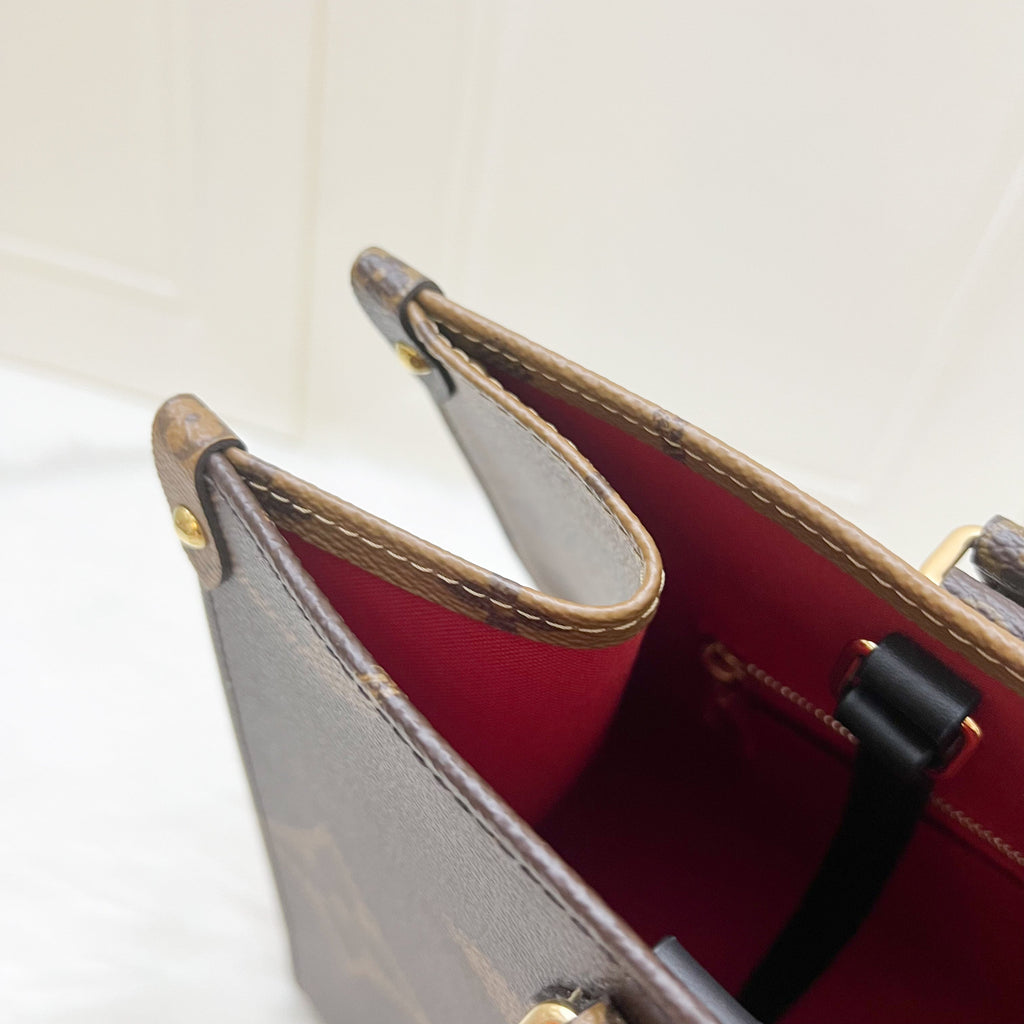 LV Onthego MM in Reverse Giant Monogram Canvas and GHW