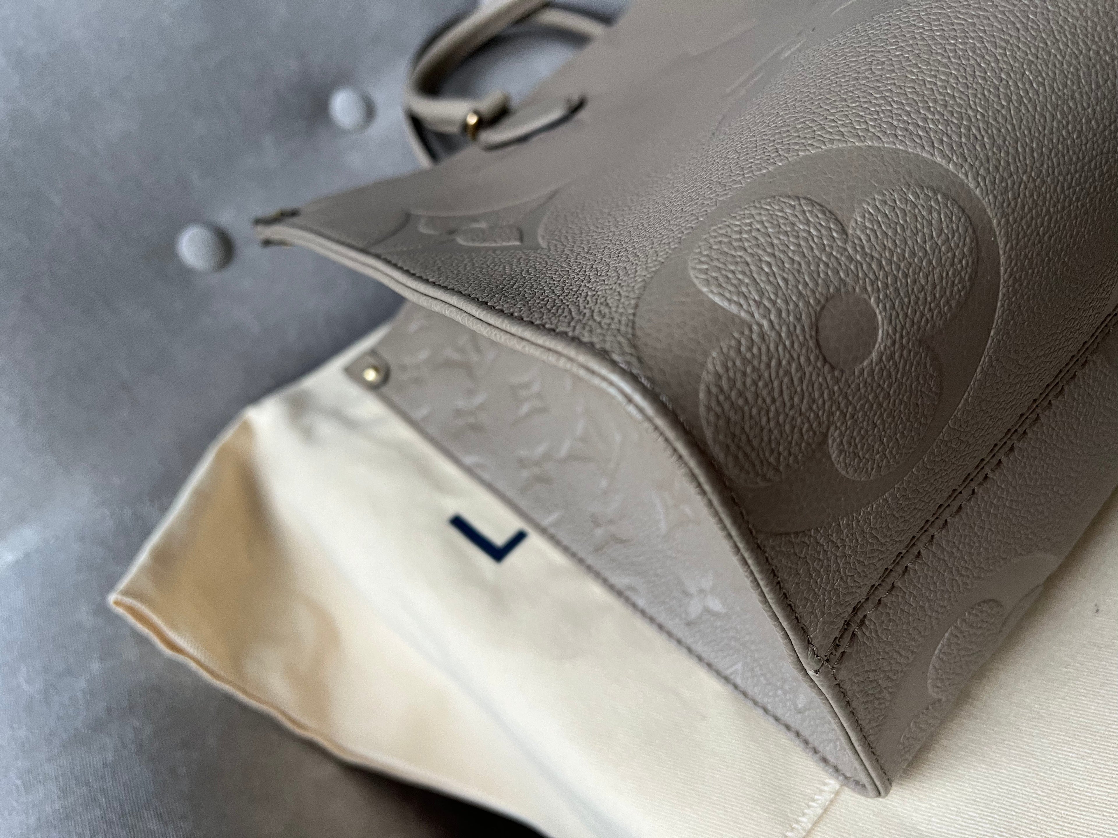 Louis Vuitton On the Go MM Dune Empreinte (RRP £2,480)