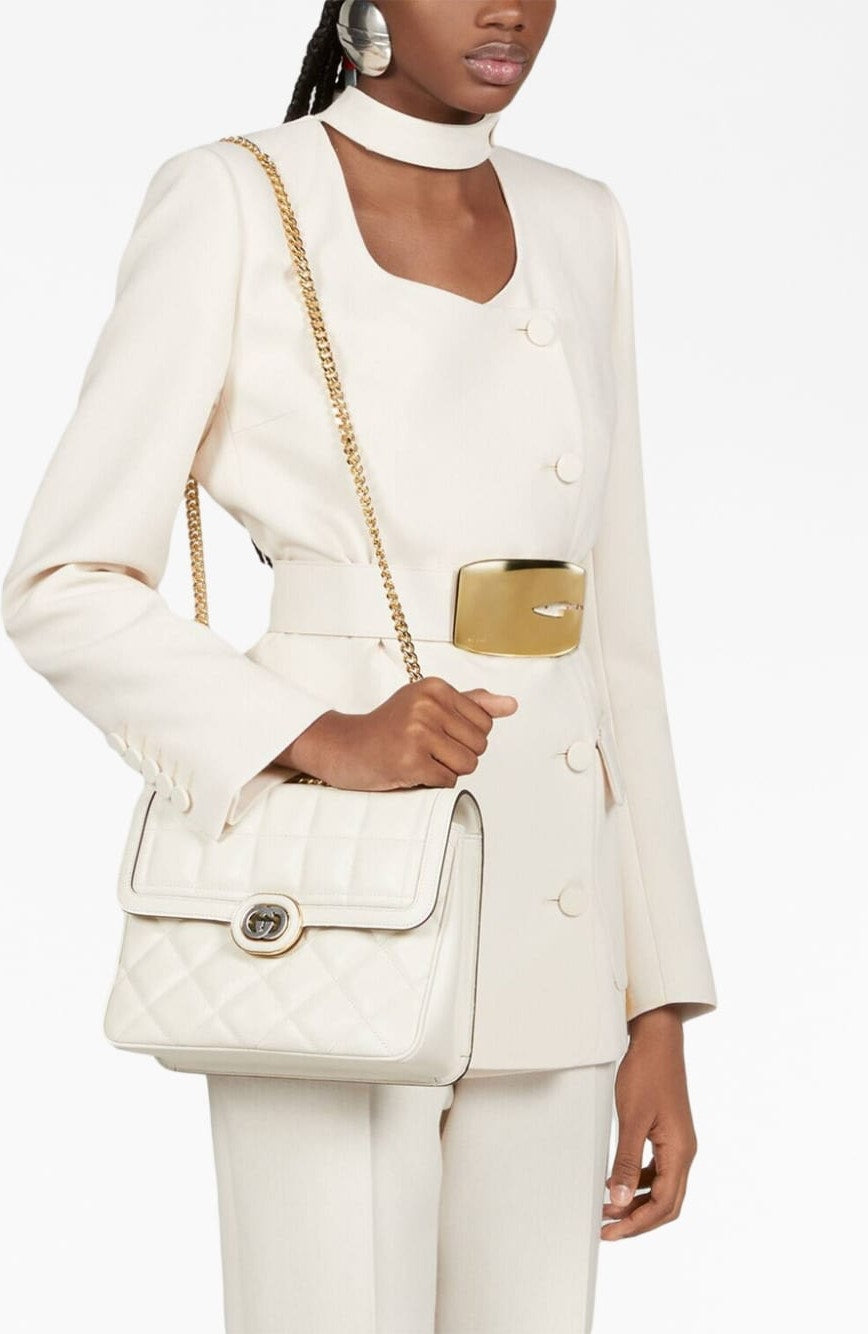 EXQUISITE OFF-WHITE LEATHER BAG.