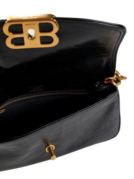BLACK BAG WITH GOLDEN CLOSURE LOGO