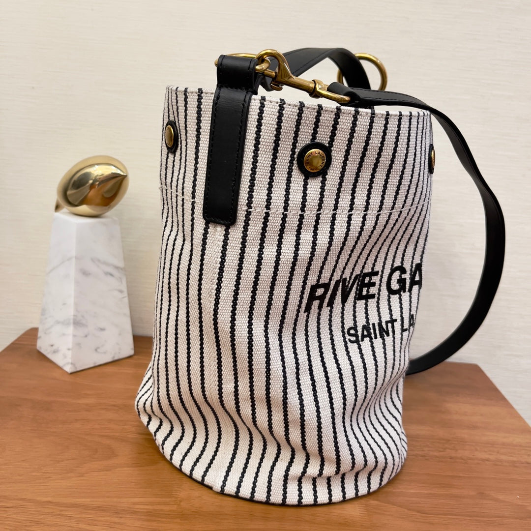 GLAMI Rive Gauche Bucket Bag In Striped Canvas For Women 11.8in/30cm Black And White YSL 669299FAAE59583