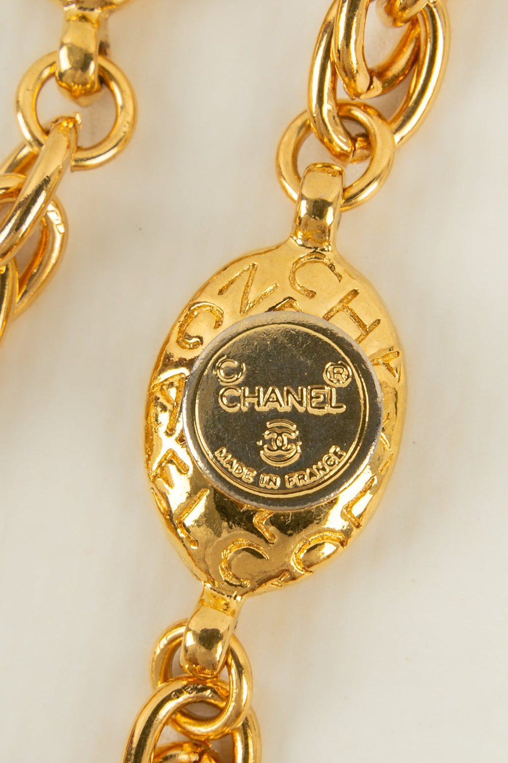 Collier / sautoir en mÃƒÆ’Ã‚Â©tal dorÃƒÆ’Ã‚Â© Chanel