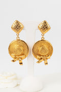 Boucles d'oreilles dorées Chanel